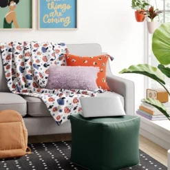 Color Block With Contrast Piping Pouf - Room Essentialsā¢